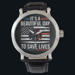Beautiful Day To Save Lives Firefighter Watch<br><div class="desc">Beautiful Day To Save Lives Firefighter Celebrate bravery and service with the “It’s a Beautiful Day To Save Lives” PNG featuring a distressed American flag backdrop and a red-blue firefighter Maltese cross emblem. Perfect for firefighter pride, first responder gifts, patriotic apparel, decals, and DIY crafting. #BeautifulDayToSaveLives #ItsABeautifulDayToSaveLives #FirefighterPNG #FirefighterDesign #MalteseCross...</div>