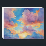 Beautiful Day Wooden Block Art Wooden Box Sign<br><div class="desc">This piece is adorned with vibrant watercolor clouds embracing a subtle rising yellow sun. The addition of U2's timeless lyrics adds a powerful layer of motivation to this accessory. "It's a beautiful day. Don't let it get away" serves as a daily reminder to seize the moment, appreciate the beauty around...</div>