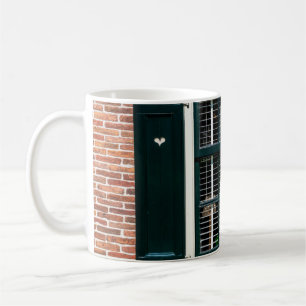 Beautiful dutch traditional houses. Brick wall wit Coffee Mug