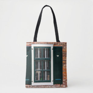 Beautiful dutch traditional houses. Brick wall wit Tote Bag