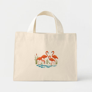 Beautiful flamingos in lake mini tote bag