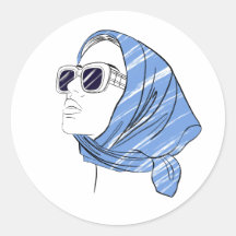 Beautiful girl in a blue bandanna and sunglasses