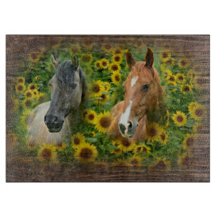 Beautiful Horses in Field of Sunflowers Cutting Board