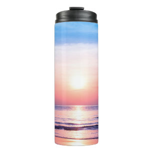 Beautiful morning sunrise, blue sea, pink sky, whi thermal tumbler