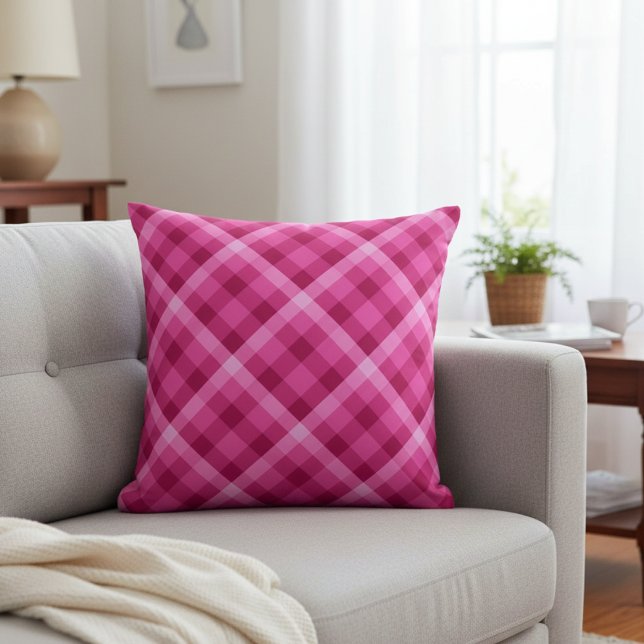Beautiful Pink Magenta Plaid Throw Pillow (Beautiful Pink Magenta Plaid Throw Pillow on a sofa in a living room.)