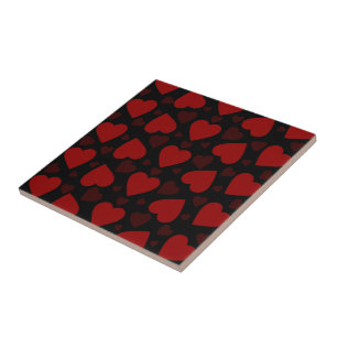 Beautiful red heart pattern on black  ceramic tile