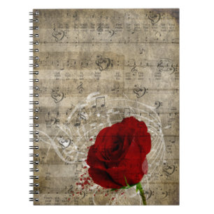 Beautiful red rose music notes swirl faded piano notebook