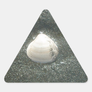 Beautiful Seashell in the Sand: A Salty Souvenir Triangle Sticker