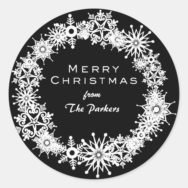 Beautiful snowflakes on a black background classic round sticker (Front)