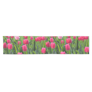 Beautiful spring pink tulip flowers short table runner