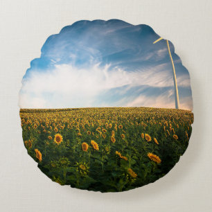 beautiful sun flowers field with cloudy blue sky a round cushion