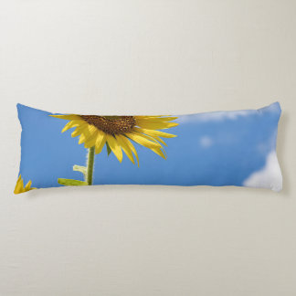 beautiful sun flowers with cloudy blue sky body cushion