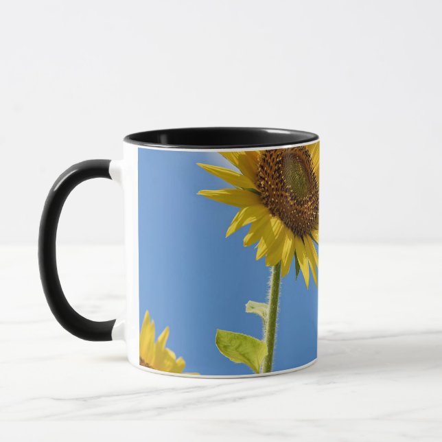 beautiful sun flowers with cloudy blue sky mug (Left)