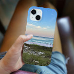 Beautiful Sunset Beach Photography Personalised iPhone 15 Case<br><div class="desc">This picturesque beach photography phone case features a photo from Destin Florida. Personalise with your name or monogram under the gorgeous pink and orange sunset gently touching the ocean waves above the sand and sea grass. Lovely seaside iPhone case for summer.</div>