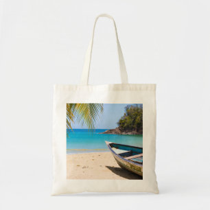 Beautiful Tropical Beach with a Rowboat Tote Bag