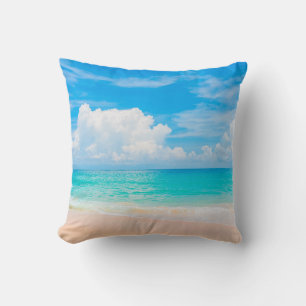 Beautiful tropical beach with blue sky and white c cushion