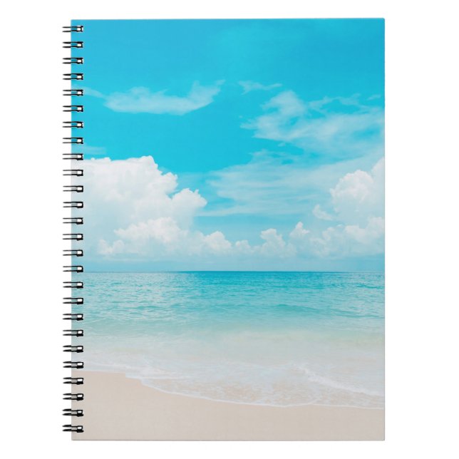 Beautiful tropical beach with blue sky and white c notebook (Front)