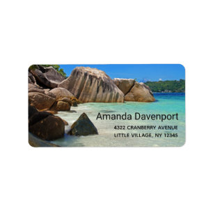 Beautiful Tropical Sea with Rock Covered Coast Label