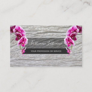 Beautiful violet pink orchid blossoms on wood busi business card