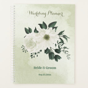 beautiful white floral greenery wedding planner
