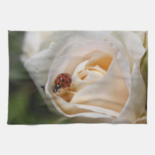 beautiful white rose flower and ladybug tea towel