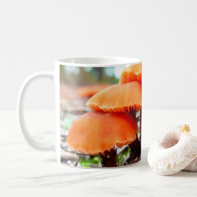 Beautiful wild mushrooms bunch in an autumn field coffee mug (With Donut)