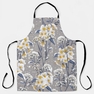 Beautiful winter flower blooming in the snow delic apron
