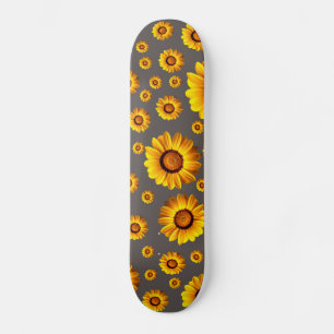 Beautiful yellow flowers on grey background  skateboard