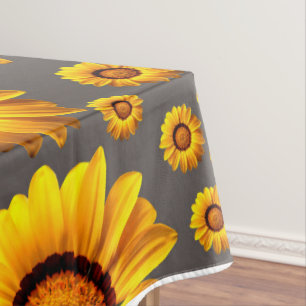 Beautiful yellow flowers on grey background tablecloth