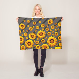 Beautiful yellow flowers on grey, black stripes fleece blanket