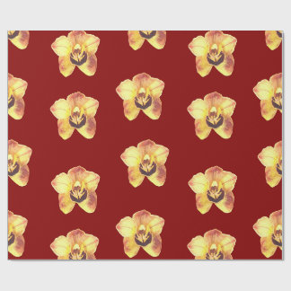 beautiful yellow orchid on a ruby red background wrapping paper