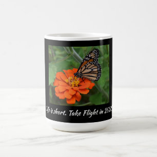 BeautifulButterfly landing on top of orange flower Coffee Mug