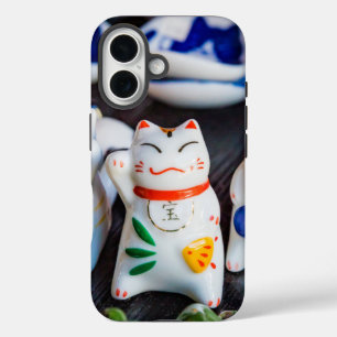 Beckoning cat figurines iPhone 16 case