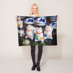 Beckoning cat figurines fleece blanket