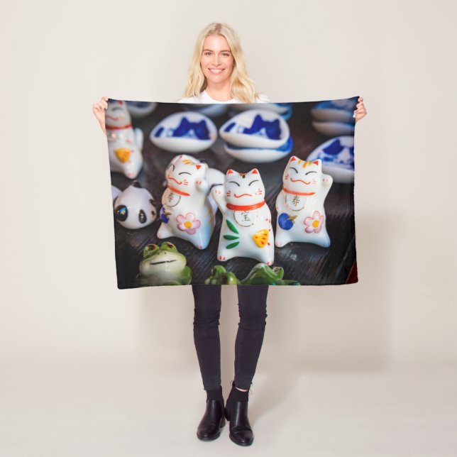 Beckoning cat figurines fleece blanket (In Situ)