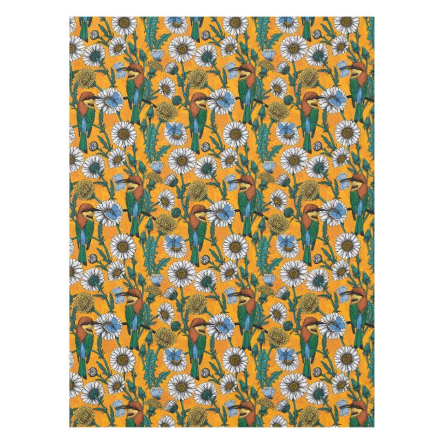 Bee-eaters, blue butterflies and daisies on orange tablecloth