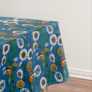 Bee eaters on blue tablecloth