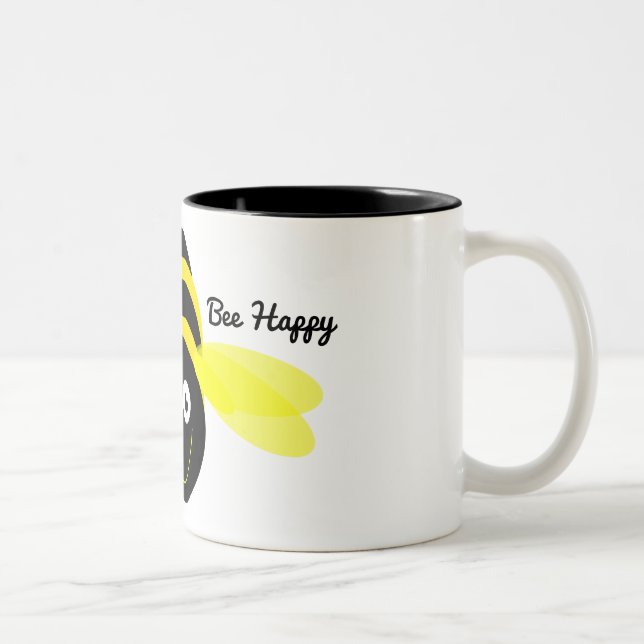 Bee Happy cartoon on a white mug black inside. (Right)