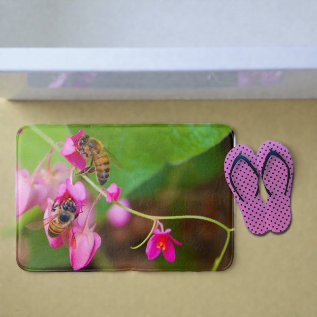 Bees On Coral Vine Flowers Photograph Bath Mat (Bees on pink coral vine flowers bath mat. )