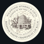 Beeswax Lip Balm Vintage Skep Ivory Honeycomb Classic Round Sticker<br><div class="desc">Custom Lip Balm label with vintage illustration of a bee-hive surrounded by an old world garden with wildflowers,  and little bees. Dotted circle border. Honeycomb Pattern in background. Personalise with your name,  apiary,  location,  cell number,  and ingredient list.</div>