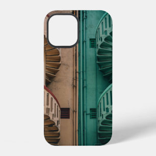 Beige and green concrete spiral stairs beside buil iPhone 12 case