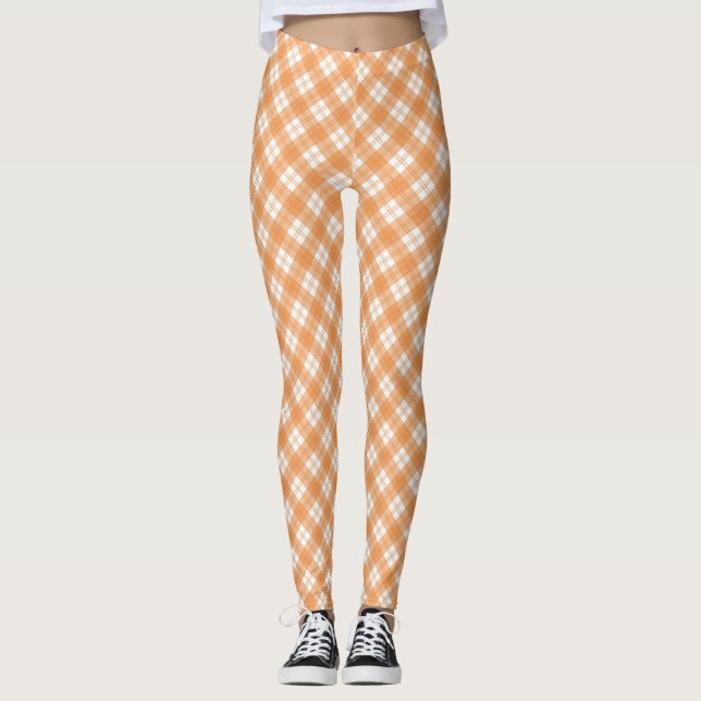 Beige and white chequered leggings displayed  (Front)