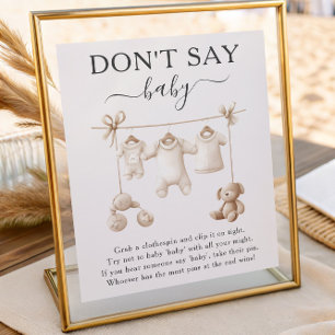 Beige Baby Clothes And Toys Don't Say Baby Sign