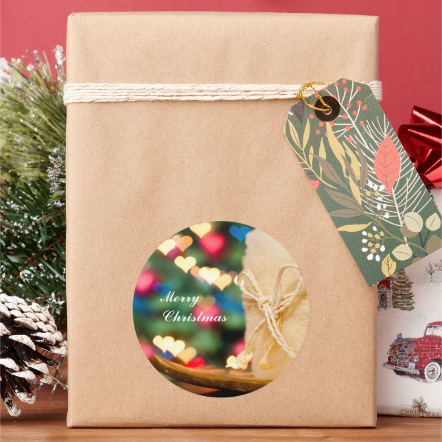 Beige candle and Colourful heart bokeh Christmas Classic Round Sticker (Holiday)