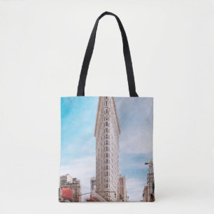 BEIGE CONCRETE BUILDING NEAR CARS TOTE BAG