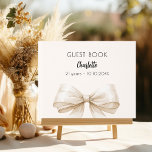 Beige cream bow birthday guest book<br><div class="desc">A beig,  cream background colour. Decorated with a large bow.  Personalise and add your name,  age.</div>