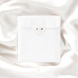 Beige Monogram Elegant Wedding Classic Round Sticker<br><div class="desc">Add a touch of elegance to your wedding details with this personalised sticker featuring the couple’s monogram at the centre, creating a refined focal point. The text is beautifully rendered in an elegant serif font, offering a timeless and sophisticated design. Ideal for sealing wedding invitations, favours, or gift bags, this...</div>