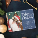 Believe in Christmas magic 2 family photos blue Holiday Card<br><div class="desc">Modern holiday greeting card featuring one of your favourite Christmas family portraits on the left complemented by the words "Believe in the magic of Christmas" on the right over a festive blue background, customisable with your own greeting message. You can upload one more picture on the reverse of the card....</div>