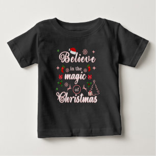 Believe In The Magic Of Christmas Xmas Quotes Des Baby T-Shirt