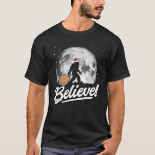 Believe Santa Bigfoot Christmas Snow Moon Night Gr T-Shirt